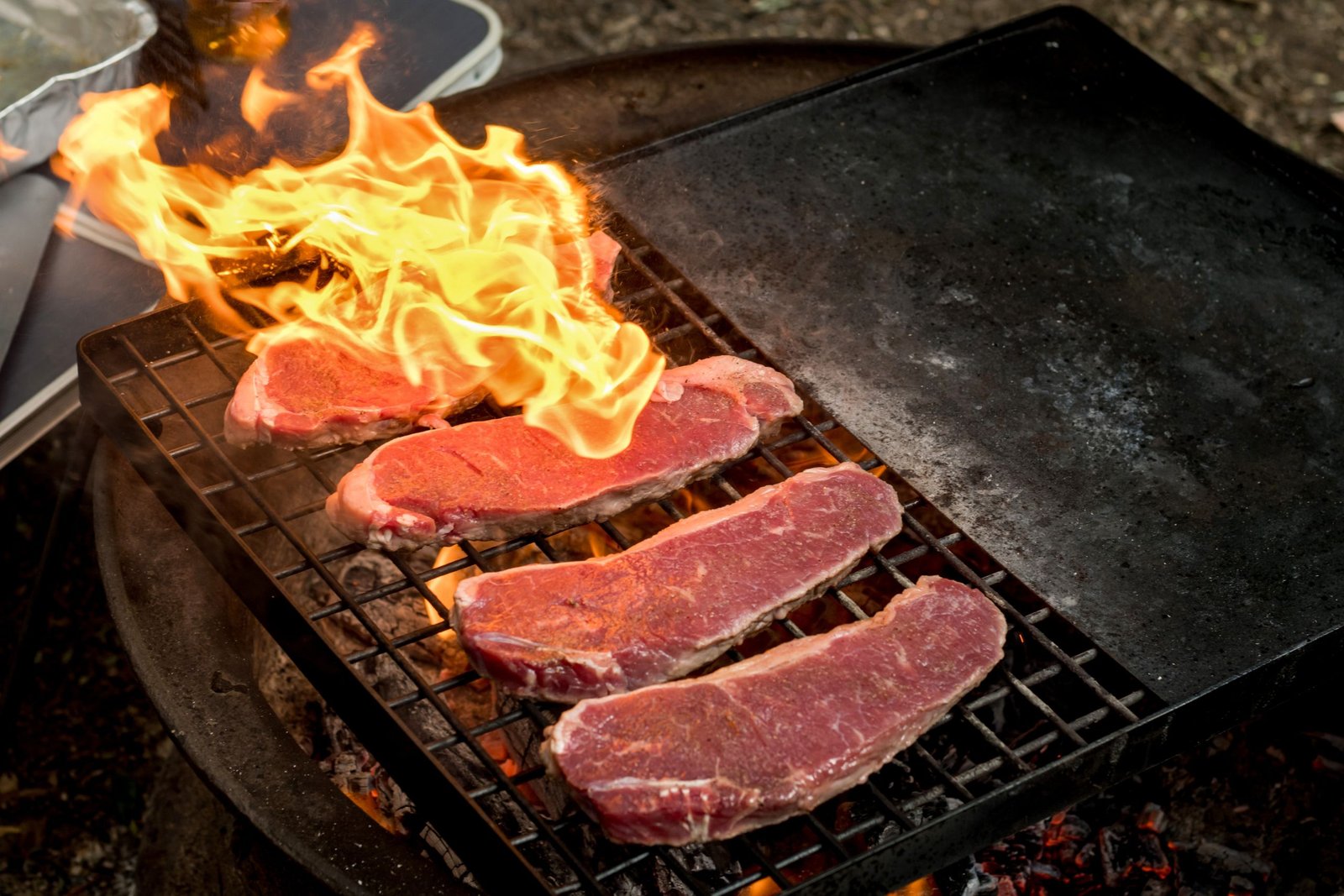Guests enjoying a hibachi at home Destin FL experience with fresh food and interactive chef performance at a beach house