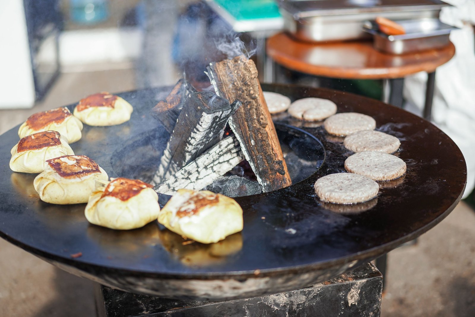 A comparison between hibachi restaurant and private hibachi chef experience in Rosemary Beach with guests enjoying both settings