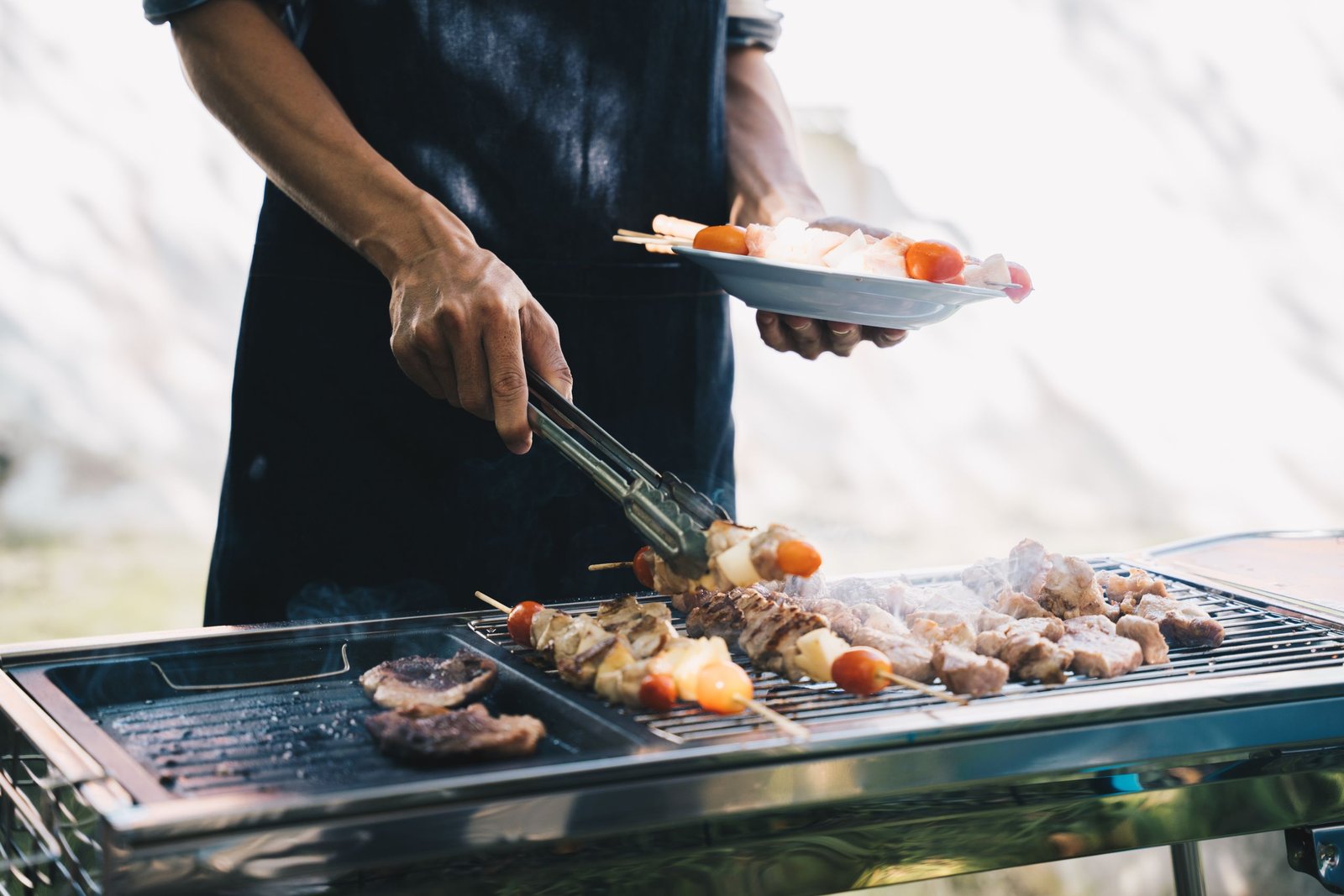 Guests enjoying a hibachi at home Santa Rosa Beach dinner with live cooking and entertainment at a beach house