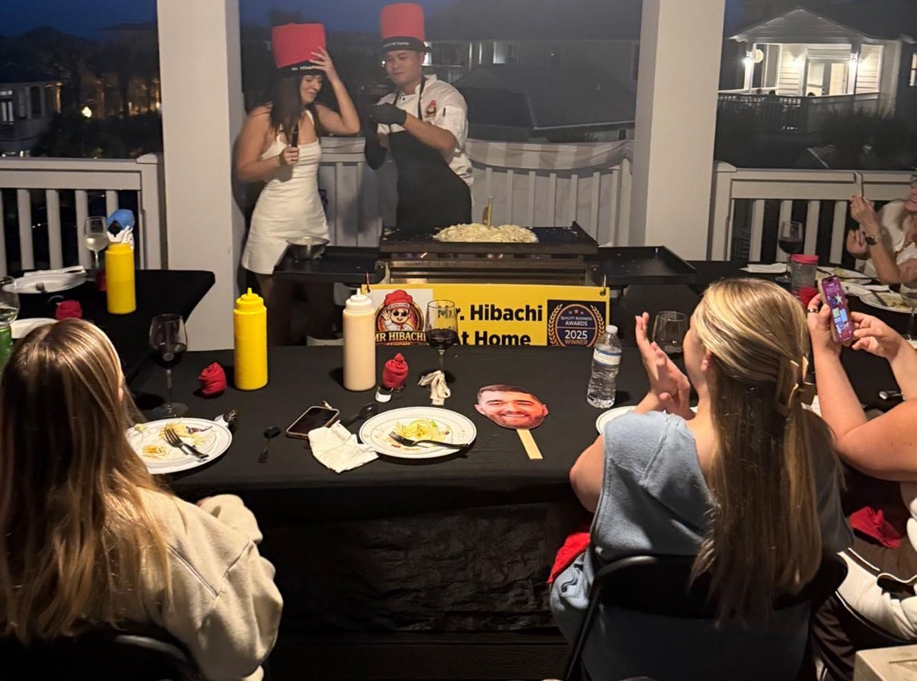Employees enjoy a corporate event catering experience in Panama City Beach during a company celebration.