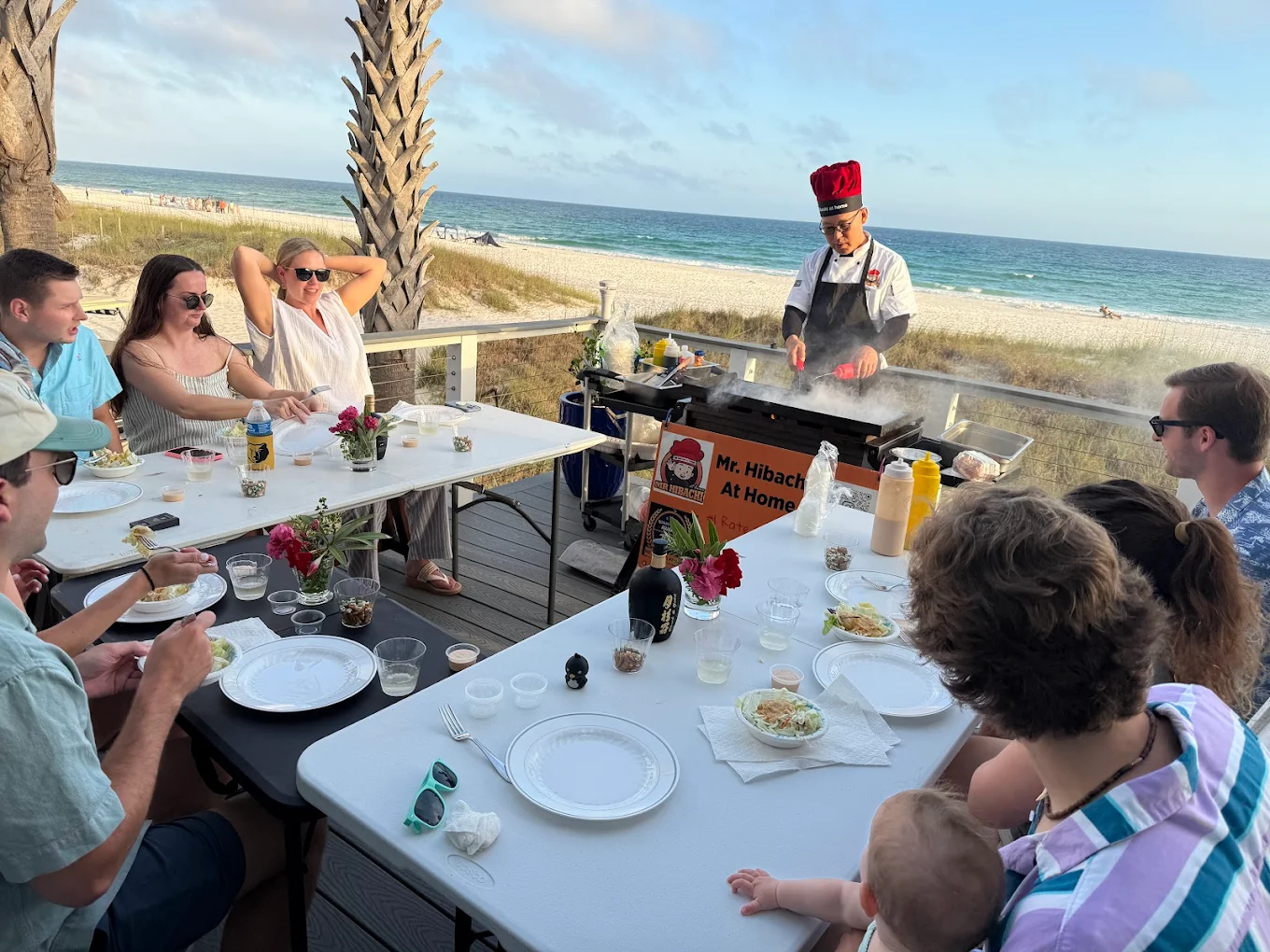 A private hibachi chef prepares fresh meals during a backyard hibachi party near 30A.